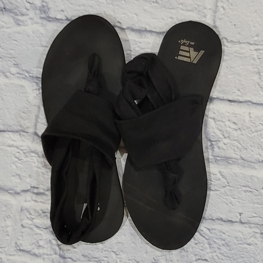 FREE Black flip flops W/ANY PURCHASE OF $25